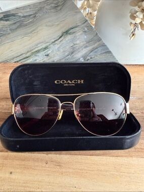 Coach Gold Aviator Sunglasses with Black Gradient Lenses